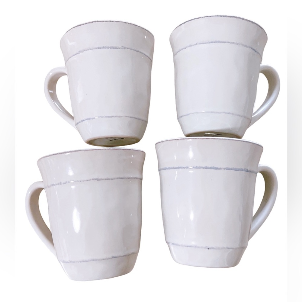 - Set of 4 handmade mugs.